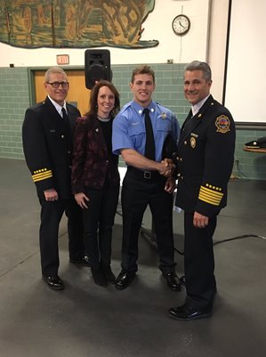 police officers and family standing together